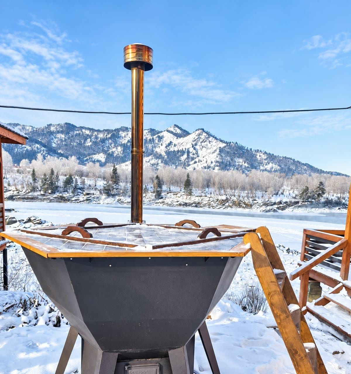 An Ember Borea hot tub outdoors in deep snow